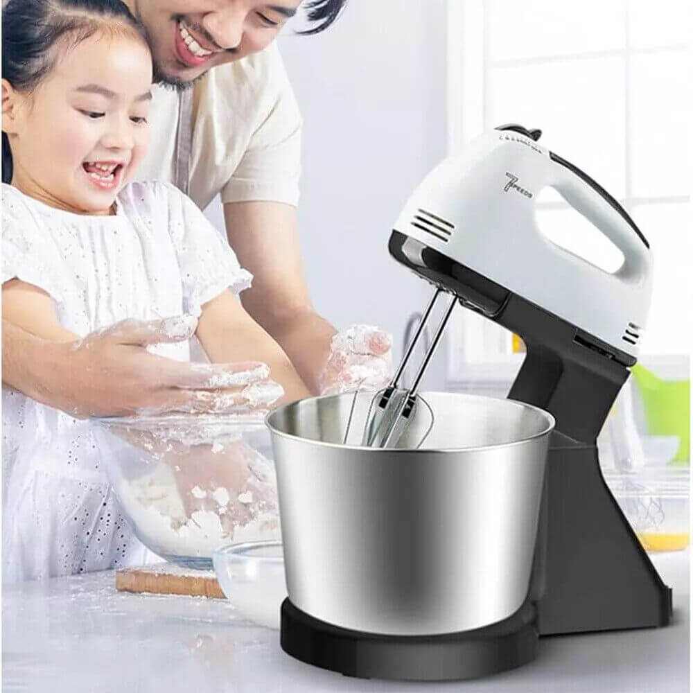 7-Speed Electric Stand Mixer with tilt-head design and multiple attachments on kitchen countertop