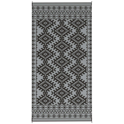 Reversible Waterproof Outdoor Rug folded and carried in bag by family, showcasing compact and portable design.