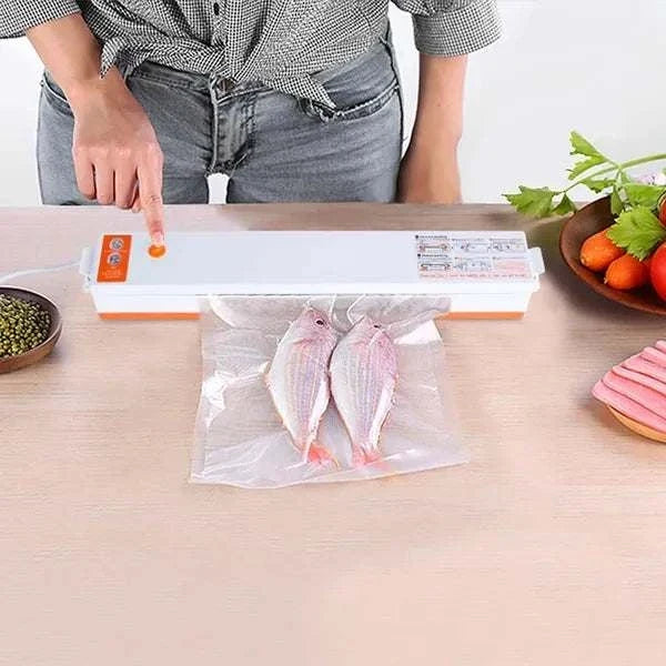 Electric Food Vacuum Sealer machine sealing fresh food with airtight vacuum preservation