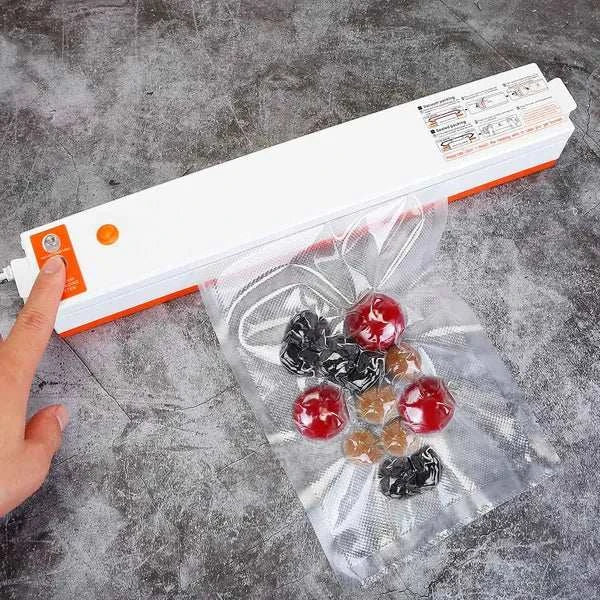 Electric Food Vacuum Sealer in use, sealing food items for preservation.